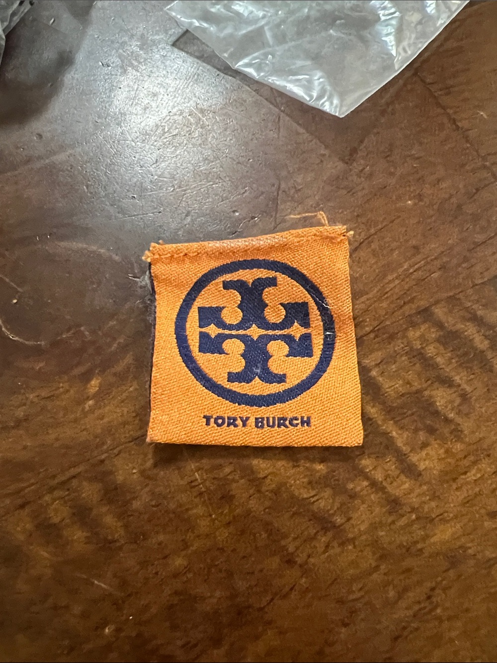 Tory Burch Orange Fabric Logo Patch with Navy Emblem